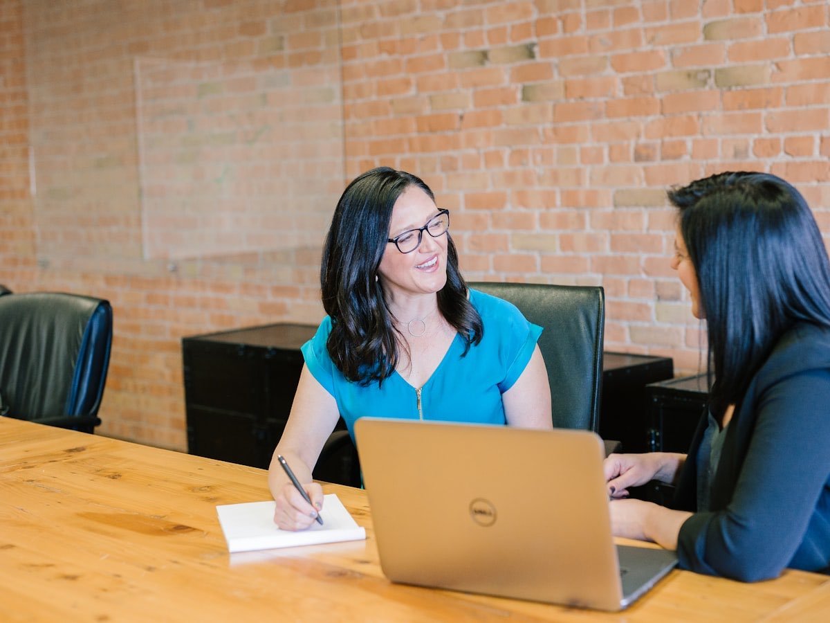 An adviser discussing funding options with a client