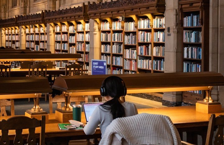 A student at work in a university library