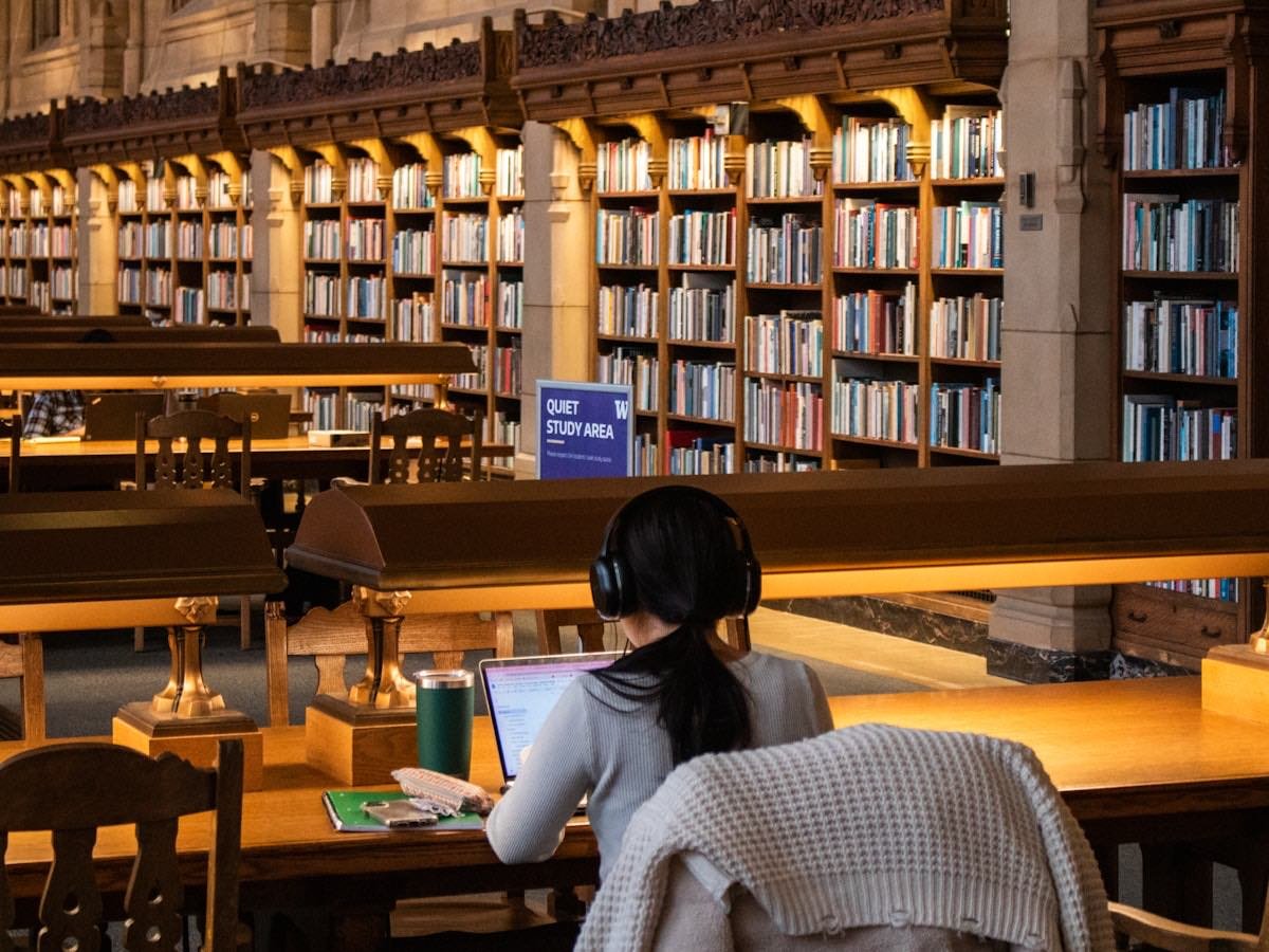 A student at work in a university library